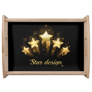 Five gold stars on black serving tray