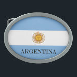 Flag of Argentina Bandera De Argentina Oval Belt Buckle<br><div class="desc">Argentina flag Bandera De Argentina Argentina flag Bandera De Argentina The blue and white colors were chosen by Manuel Belgrano, the leader of the Argentinian revolution against Spain, and represent the blue sky parting to reveal white clouds, as is said to have happened when the Liberation demonstration began in Buenos...</div>