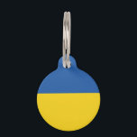 Flag of Ukraine Button Pet ID Tag<br><div class="desc">The flag of Ukraine is a banner of two equally sized horizontal bands of blue and yellow. The top represents sky and the yellow represents wheat. 
 The National Flag of Ukraine</div>