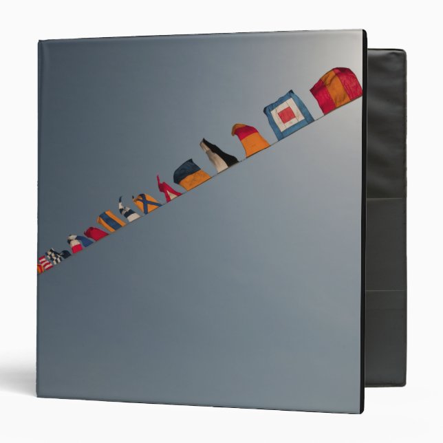 Flags fly over the deck of the USS Iwo Jima Binder (Front/Inside)