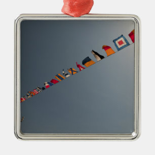 Flags fly over the deck of the USS Iwo Jima Metal Ornament