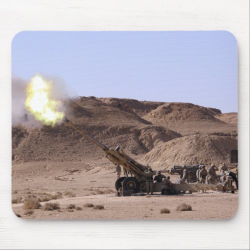 Flame and smoke emerge from the muzzle mouse pad