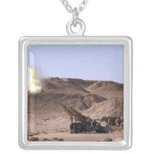Flame and smoke emerge from the muzzle silver plated necklace
