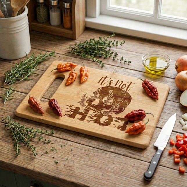 Flaming Skull Funny Kitchen Gift Its Not Hot Engraved Cutting Board (For the cook who laughs at heat, this flaming skull board brings the spice.)