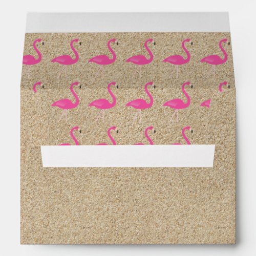 Flamingo Baby Shower Invite Envelope in beach sand