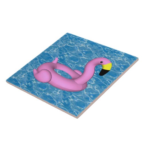 Flamingo pool toy on blue water  ceramic tile