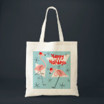 Flamingo Santas Blue Happy Holidays tote bag<br><div class="desc">A lively,  quirky Christmas design with retro touch featuring pink flamingos wearing Santa hats,  cream geometric shapes,  and stars on a blue (colour change) background.  A customizable design for you to personalise with your own text,  images and ideas. An original digital art image created by QuirkyChic.</div>
