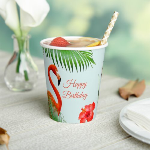 Flamingos hibiscus and palm leaves on light blue  paper cups