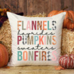 Flannels Hayrides Pumpkins Bonfires Plaid Fun Fall Throw Pillow<br><div class="desc">Add a touch of fall with our pillow adorned with Flannels Hayrides Pumpkins Sweaters Bonfires" in a fun mixed font,  back in coordinating black plaid.  View all of our holiday decor in our Zazzle store!</div>
