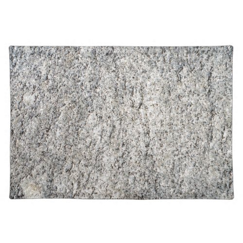 Flat surface of a gray granite stone placemat