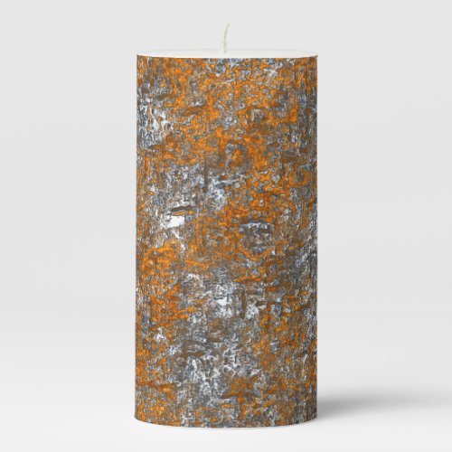 Flecked with golden orange over whitish grey rough pillar candle