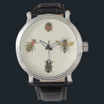 Flies and Beetles by Vision Studio Watch<br><div class="desc">This Vision Studio print may just be for the insect lovers! Flies and beetles congregate on a cream background,  framed by a black border. If you are into entomology,  or know someone who is,  this is a great piece!</div>