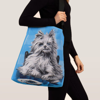 floofy dog eating at the table crossbody bag