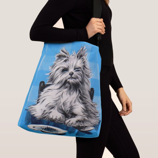 floofy dog eating at the table crossbody bag (Close Up)