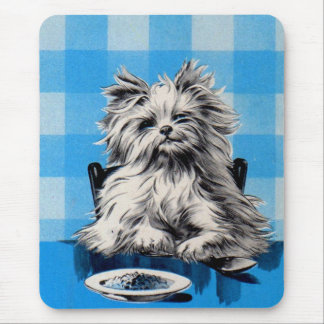floofy dog eating at the table mouse pad