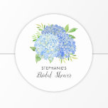 Floral Blue Hydrangea Bouquet Bridal Shower  Classic Round Sticker<br><div class="desc">These bridal shower stickers feature watercolor blue hydrangea flowers and green foliage Personalize the text with the bride's name. These stickers are ideal for use as envelope seal stickers or for decorating favors. Matching bridal shower party supplies also available.</div>