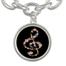 floral design music clef on black