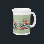 Floral Fox in Basket with Quilt & Flowers Beverage Pitcher<br><div class="desc">This charming cute fox illustration captures the heart with its sweet woodland nursery art appeal, featuring a gentle baby fox nestled in a woven basket draped with a cozy, patchwork quilt. Surrounded by delicate florals in soft blush, cream, and dusty blue, the fox wears a whimsical flower crown, blending floral...</div>