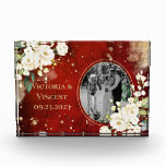 Floral Gold Red Cream Names Wedding Photo Block<br><div class="desc">Gorgeous white botanical floral spray on vintage scarlet red with faux gold splotches. The red antique watercolor rustic background is such a rich classy look mixed with the cream colored flowers is lovely. Personalize with photo, names and wedding date. This is a lovely keepsake for the newlyweds. Beautiful faux gold...</div>