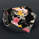 Floral Hibiscus Pineapple Hawaiian Print Black Neck Tie<br><div class="desc">Exotic pink and white hibiscus flowers, yellow lilies, pineapples, palm fronds and tropical foliage on a black background, this men's neck tie is cool for the office, a night on the town, a wedding, for the groom or groomsmen or give as a gift to your husband, dad, brother or best...</div>