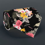 Floral Hibiscus Pineapple Hawaiian Print Black Neck Tie<br><div class="desc">Exotic pink and white hibiscus flowers, yellow lilies, pineapples, palm fronds and tropical foliage on a black background, this men's neck tie is cool for the office, a night on the town, a wedding, for the groom or groomsmen or give as a gift to your husband, dad, brother or best...</div>