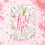 Floral Love You Custom Birthday or Any Occasion  Card<br><div class="desc">This elegant greeting card features the phrase “love you” in flowing pink script, framed by a delicate arrangement of pink blossoms, stylized green leaves—including heart-shaped accents—and subtle swirls and dots. The inside showcases a complementary pink background with sample text that reads: More than words can say. Happy Birthday. Click “Personalize...</div>