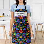 Floral Mexican Pattern Abuela's Kitchen Custom Apron<br><div class="desc">Fun apron featuring a Mexican pattern of colorful flowers, birds and ornaments set against a black background and two lines of custom text. Add a person's name, your Abuela's name, restaurant name, cafe or shop name or delete the text and rectangle and just use the pattern. Perfect for budding chefs,...</div>