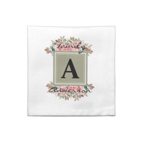 Floral monogrammed green and white family name    cloth napkin