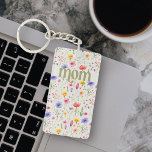 Floral Pattern Colorful Wildflower Soft Green Mom Keychain<br><div class="desc">Keychain for mom with colorful wildflower pattern and bold modern green lettering on a soft green background,  The design features pretty wild flowers with "mom" lettered in ornate typography. Please browse my Mother's Day Wildflower Collection for more flowery cards and gifts.</div>
