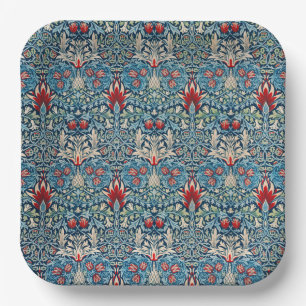 Floral pattern on green leaves blue background paper plates