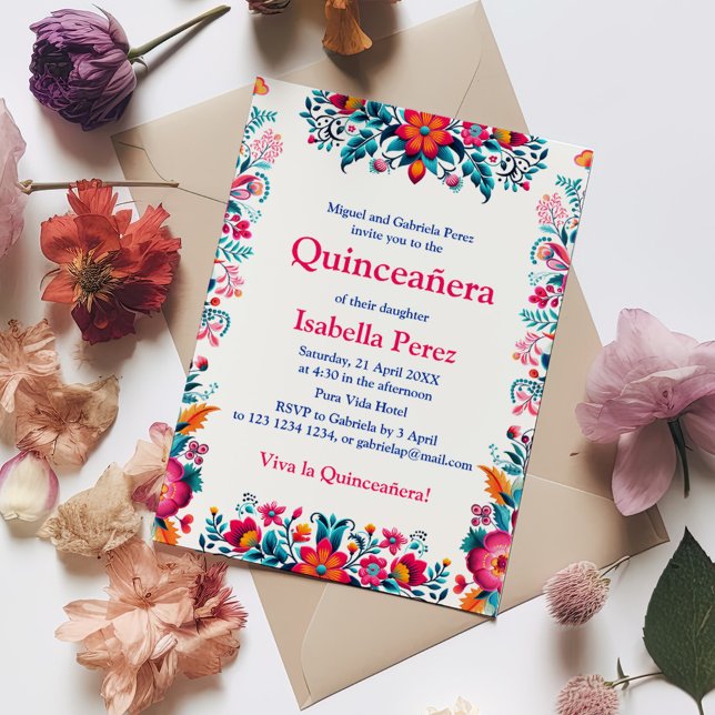 Floral Quinceanera White Mexican Fiesta Birthday Invitation (Floral Quinceanera White Mexican Fiesta Birthday Invitation on a table with colorful flowers.)