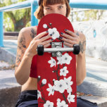 Floral Red And White Cherry Blossom Skateboard<br><div class="desc">Pretty white and black cherry blossom on a shimmering ruby red background.</div>