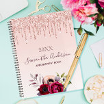 Floral rose gold glitter blush pink 2024 planner<br><div class="desc">A faux rose gold and blush pink gradient background with elegant rose gold faux glitter drips, paint dripping look. Decorated with flowers in burgundy and rose gold. Template for a year. Personalize and add a name and a title. The name is written in dark rose gold with a modern hand...</div>