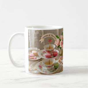 Floral table, teacups, tiered trays macarons queen coffee mug