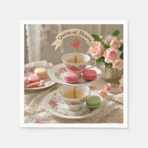 Floral table, teacups, tiered trays macarons queen napkins