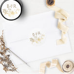 Floral White and Gold Wedding Envelope Seal/Favor Classic Round Sticker<br><div class="desc">Elegant wedding sticker with beautiful faux gold foil hand drawn floral detail and couple's initials. Ideal as envelope seal or favor label.  Part of our " White and Gold Enchanting and Celestial Collection" with a variety of coordinating products including envelopes. Visit the entire collection at:
https://www.zazzle.com/collections/white_and_gold_enchanting_and_celestial_collection-119073673253835730</div>