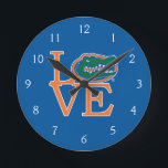 Florida Gators Love Round Clock<br><div class="desc">Zazzle offers the most exciting and unique gear for the ultimate Florida Gator fan! All of our products are officially licensed and customizable, which makes them perfect for students, alumni, family, fans, and faculty. Whether you are gearing up for tailgating, hosting a party for a Florida fan, or decorating your...</div>
