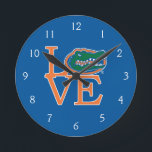Florida Gators Love Round Clock<br><div class="desc">Zazzle offers the most exciting and unique gear for the ultimate Florida Gator fan! All of our products are officially licensed and customizable, which makes them perfect for students, alumni, family, fans, and faculty. Whether you are gearing up for tailgating, hosting a party for a Florida fan, or decorating your...</div>