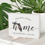 Florida Home State Rustic Family Name Wooden Box Sign<br><div class="desc">Show some home state pride with this cute wood box sign featuring "home" in black calligraphy script lettering with a silhouette map of the state of Florida standing in for the letter "O." A pink heart illustration inside the state map completes the design; you can change the position of the...</div>