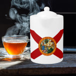 Florida State Flag Teapot<br><div class="desc">The Florida flag is the official flag of the U.S. state of Florida. It features a red saltire on a white background, with the state seal positioned at the center of this product. This looks good on any product and makes a wonderful travel keepsake. ⭐PERSONALIZE this template with your artwork....</div>