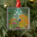 Flower Garden | Gustav Klimt Metal Ornament<br><div class="desc">Flower Garden (1905-1907) by Austrian artist Gustav Klimt is a vibrant masterpiece of early 20th-century art. This lush, impressionistic scene bursts with colorful blossoms in a mesmerizing tapestry of nature, reflecting Klimt’s decorative style and love for floral motifs. The painting’s rich textures and intricate details make it a timeless choice...</div>