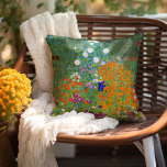 Flower Garden | Gustav Klimt Throw Pillow<br><div class="desc">Flower Garden (1905-1907) by Austrian artist Gustav Klimt. Original fine art painting is oil on canvas featuring a bright abstract landscape of colorful flowers. 

Use the design tools to add custom text or personalize the image.</div>