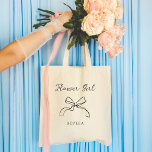 Flower Girl | Choose any Color Coquette Bow Tote Bag<br><div class="desc">This stylish,  whimsical tote says "Flower Girl" in chic,  handwritten script with an illustrated coquette bow and a spot for her name. You can customize the tote by choosing any color for the text and bow,  so your bridal wedding party can match.</div>