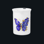 Flower Sapphire Butterfly Beverage Pitcher<br><div class="desc">Jewelry,  blue,  sapphire,  sparkling flower butterfly with wing decorated with blue,  precious flowers with gold leaves on white background.</div>