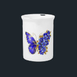 Flower Sapphire Butterfly Beverage Pitcher<br><div class="desc">Jewelry,  blue,  sapphire,  sparkling flower butterfly with wing decorated with blue,  precious flowers with gold leaves on white background.</div>
