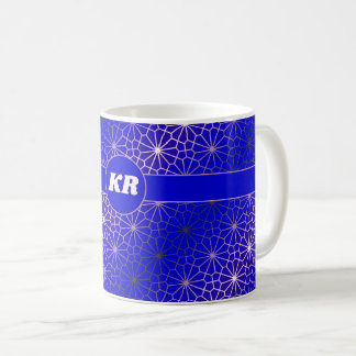 Flower shapes pattern on blue, your initials coffee mug