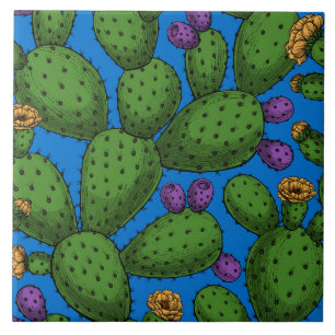 Flowering opuntia on blue ceramic tile