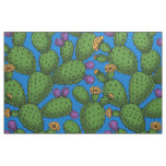 Flowering opuntia on blue fabric