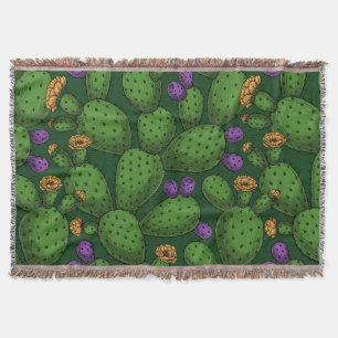 Flowering opuntia on dark green throw blanket
