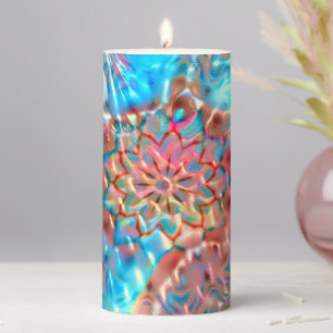 Flowering peach and aqua under hammered glass pillar candle